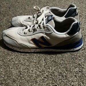 New Balance White and Blue Sneakers